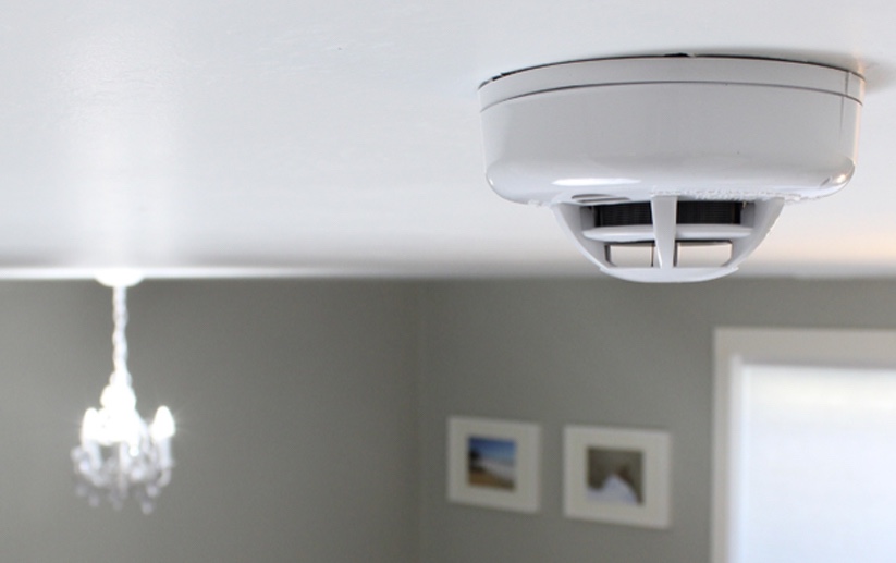 Carbon monoxide detector installed on ceiling in home