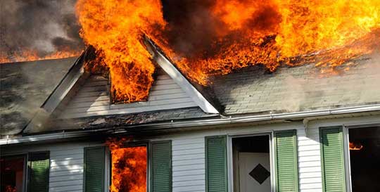 House on fire to show the necessity of home fire protection