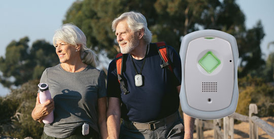 Senior couple enjoying life with their medical monitoring keyfob